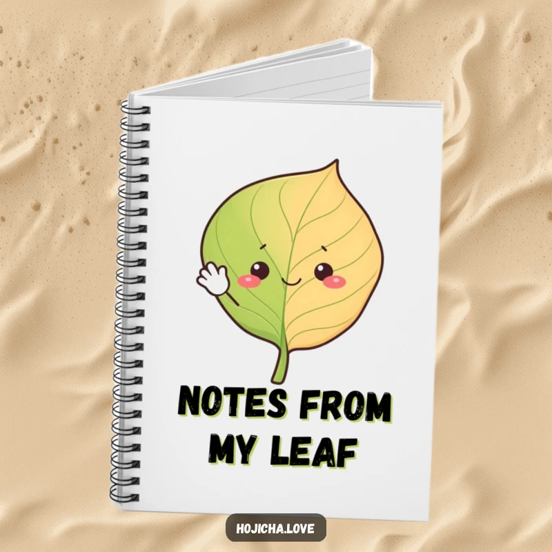 Funny hojicha leaf notebook, cheerfully waving with simple eyes, ideal for jotting down happy thoughts.